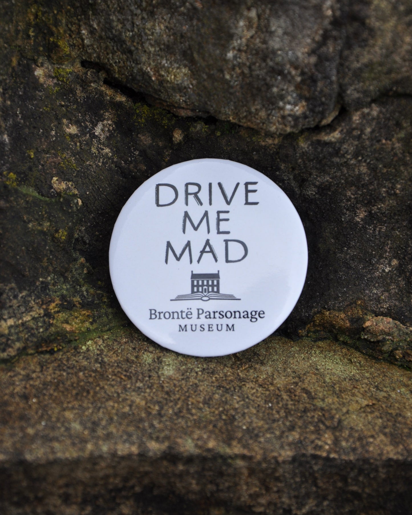 "Drive Me Mad" Wuthering Heights Badge