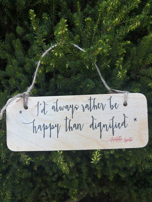 Wooden Wall Hanging: 'I'd always rather be happy than dignified'.